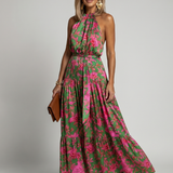 Elegantti vaaleanpunainen midi-mekko, jossa on halterneck-olkaimet