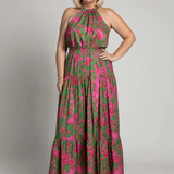 Elegantti vaaleanpunainen midi-mekko, jossa on halterneck-olkaimet